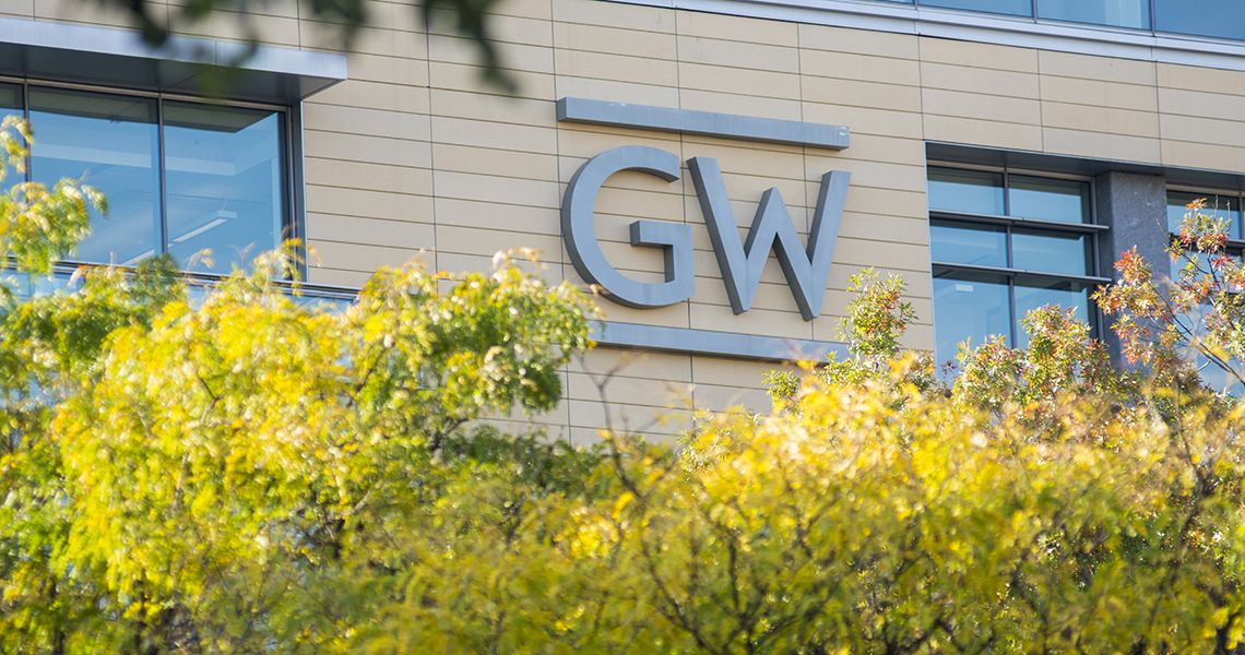 GW logo on the side of a building
